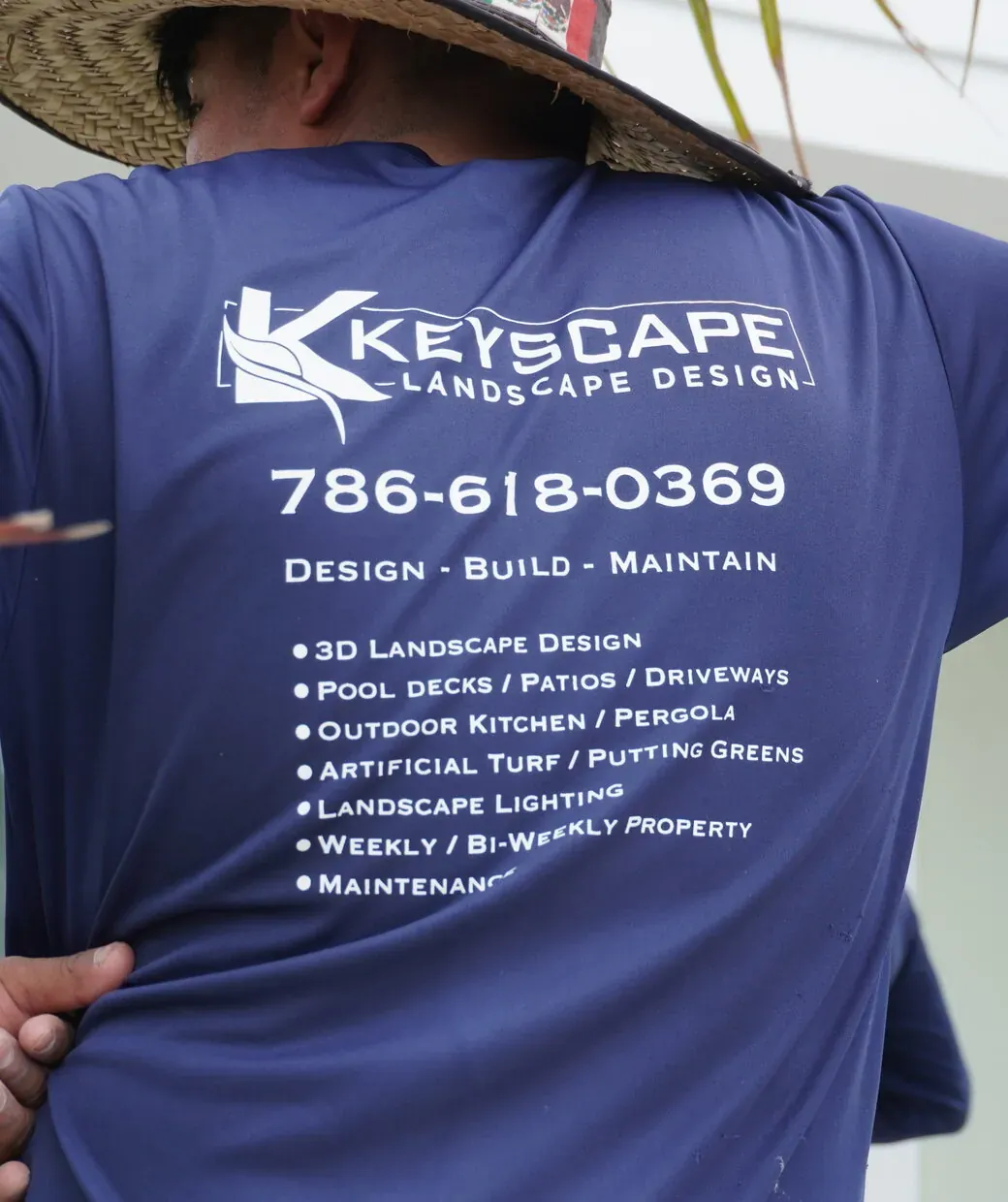 Keyscape crew member in branded Design Build Maintain shirt